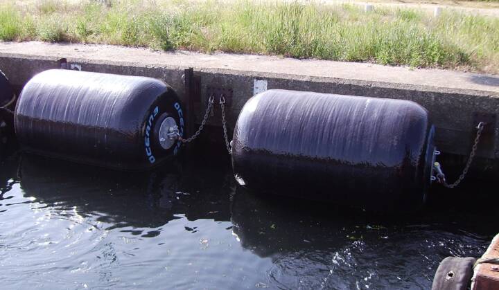 Fenders fixed on quay wall